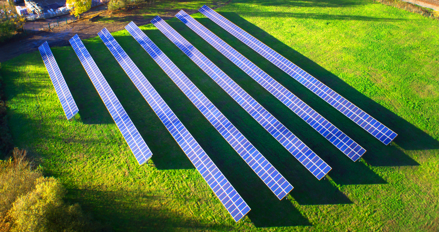 Ground mounted solar panel array in a field